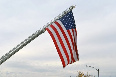 Lemoore's Officer Jonathan Diaz takes his final patrol down Hanford Armona Road The Stars and Stripes loom over Hanford Armona Road Thursday afternoon.